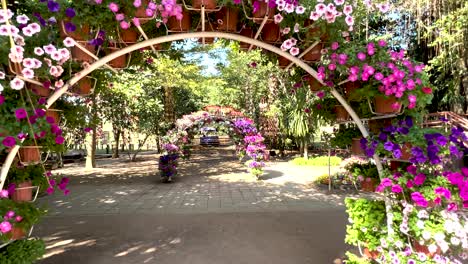 colorful floral arches in a serene garden setting