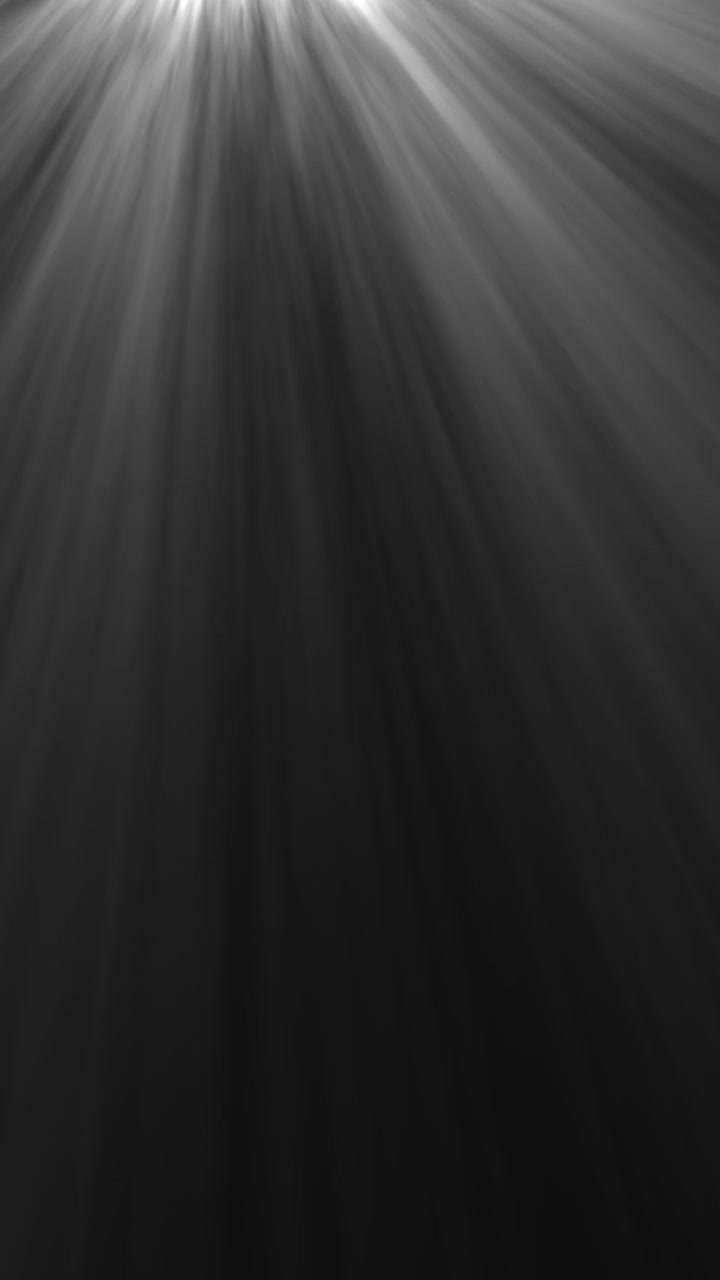 Volumetric Light Rays Shining Down on a Dark Background