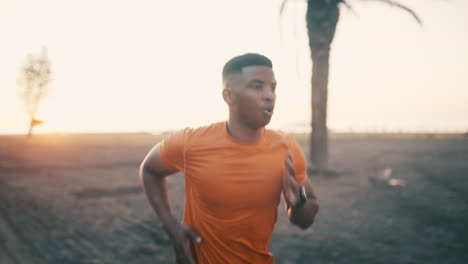 a sporty young man running outdoors