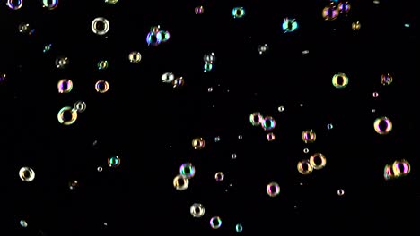 different size and color soap bubbles fly black backgrounds different size and color soap bubbles fly in the air black backgrounds
