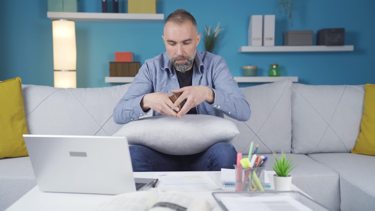 The penniless man. Home office worker.