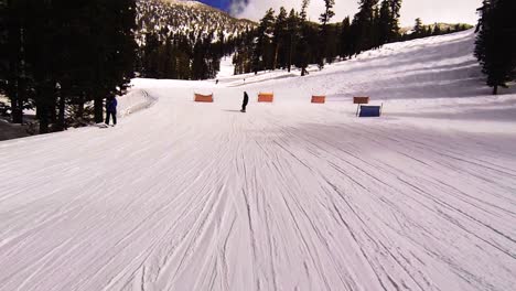 snowboarding practice on a snowy mountain slope