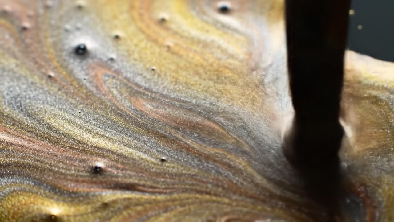 Golden and Silver Paint Swirls