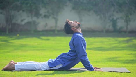 indian man doing advanced yoga