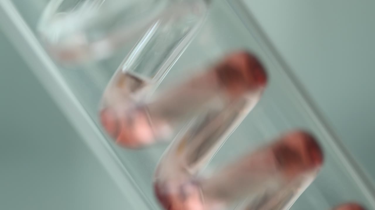 Spiral Glass Test Tube with Red Liquid