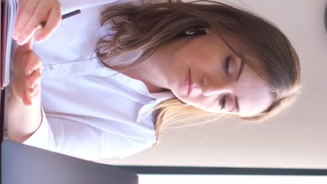 young european focused female executive manager businesswoman sitting at desk and working on laptop young european focused female executive manager businesswoman sitting at desk and working on laptop modern office corporation