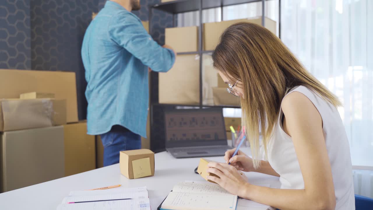 Entrepreneurial couple selling on online website.