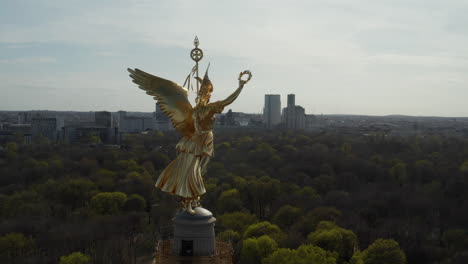 AERIAL:-Close-Up-Circling-around-Berlin-Victory-Column-Golden-Statue-Victoria-in-Beautiful-Sunlight