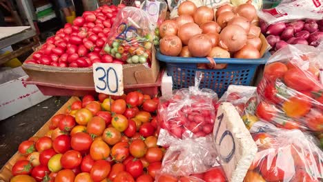 various vegetables and fruits displayed with price tags