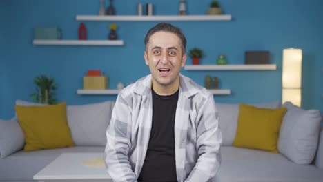 the man says wow to the camera.