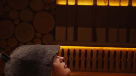 woman relaxing in a sauna