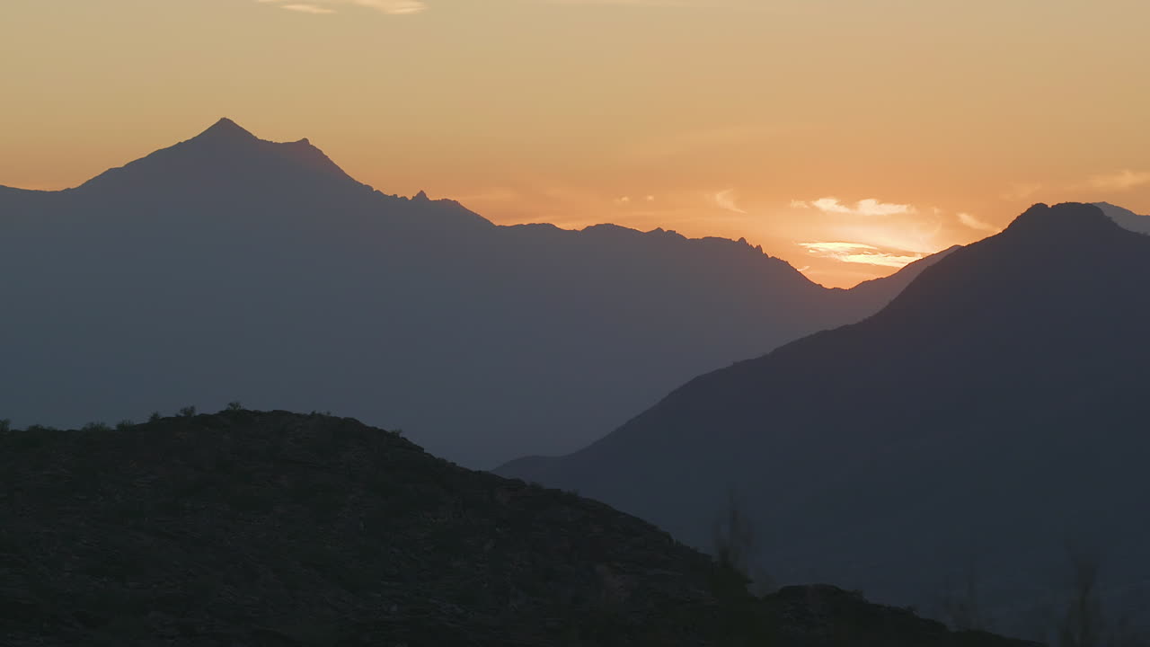 Silhouette of mountain Sunset at South Mountain in Phoenix, Arizona.
