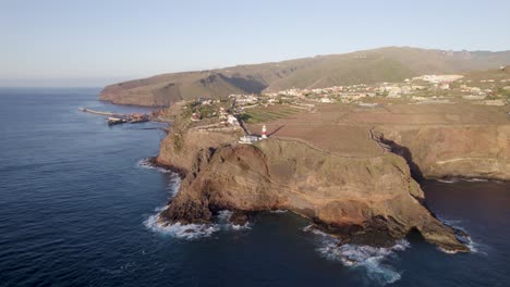 high aerial shots of the canary island of la gomera with the el faro de san sebastian lighthouse