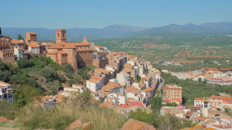 Panning-across-beautiful-colorful-historic-town-of-Vilafames-in-Castellon,-Spain-on-sunny-summer-day