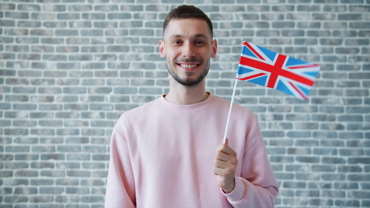 Man holding a British Flag