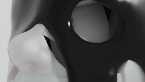 a black liquid metal flows slowly on the sculpture