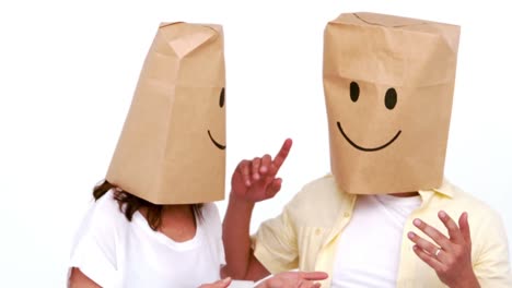 Couple-with-cardboard-bag-over-their-head