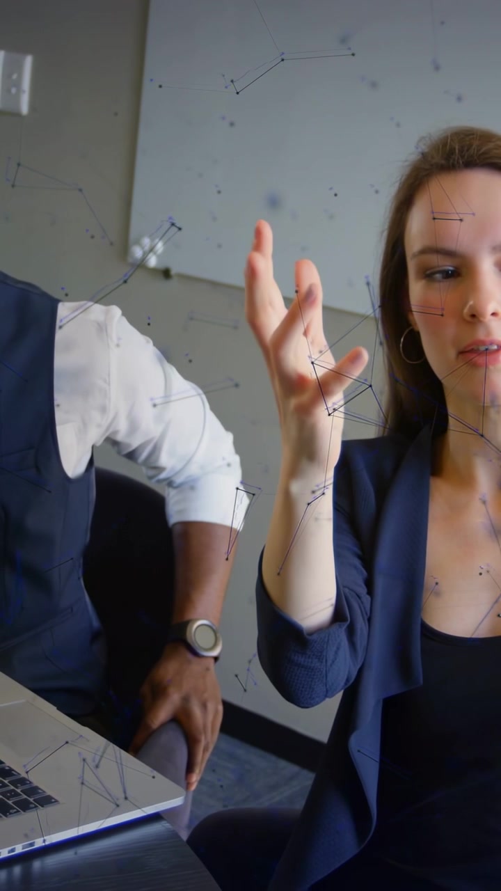 Woman raising right hand and explaining business plan, starting network overlay around laptop