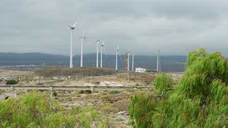 tenerife island landscape and wind turbine farm on cloudy day