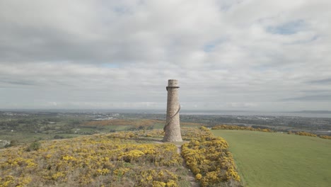 ruin of flue chimney- distinctive remnant of ballycorus leadmines in carrickgollogan hill in ireland