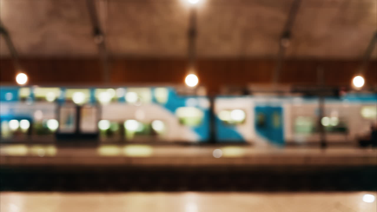 Blurred view of a train moving on the rails at the Monaco train station