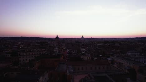 Flyover-of-Rome,-Italy-at-sunset