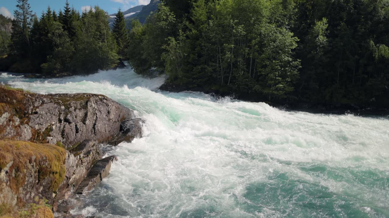 Mountain River Beautiful Nature Norway natural landscape. Lovatnet lake (also Loenvatnet) is a lake in the municipality of Stryn in Vestland county, Norway.