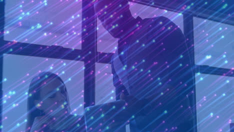collaborating with animation, business professionals using digital data visualization in office