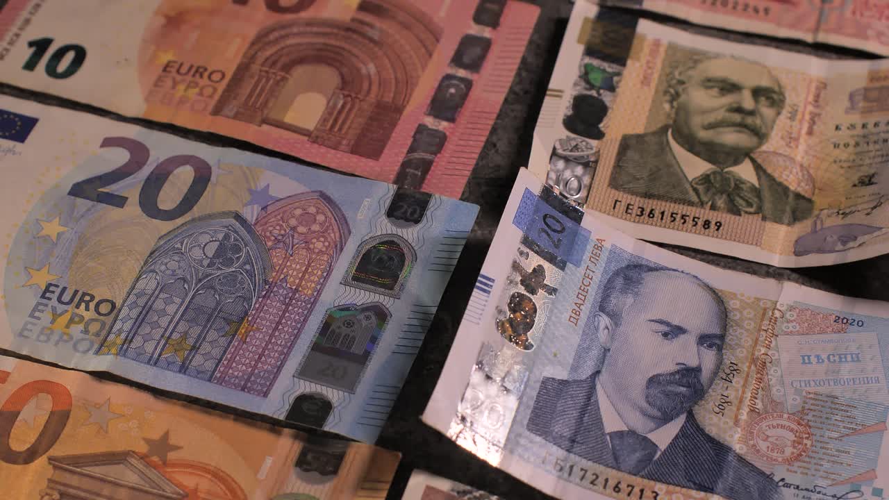 Bulgaria change currency, Bulgaria Lev to Euro. Money exchange. Paper banknotes on table. Concept, economy, competition, crisis, banking and finance. BGN,BGL. Scene F. Close up slide shot