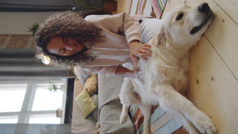 woman and dog relaxing at home