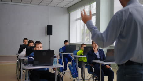 classroom scene with teacher and students