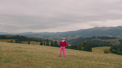 child playing in the mountains