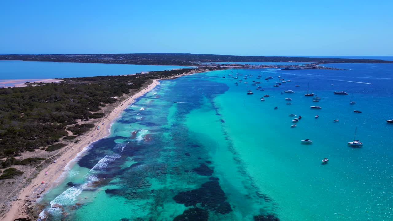 Scenic aerial view of rocky Island Formentera's turquoise azur waters and sandy beaches. Amazing aerial view flight panorama overview drone