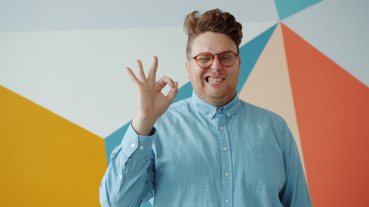 Man Making Ok Gesture