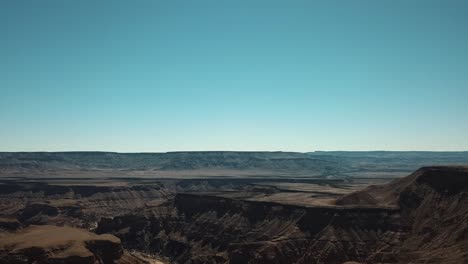 Fish-River-Canyon-in-Namibia,-Africa-Aerial-Drone-Shot