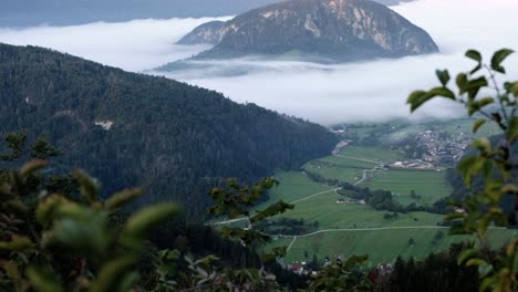 viewpoint in slovenia looking over lake bohinj with a cloud inversion