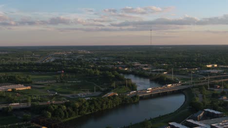 aerial drone view overlooking a traffic jam at the interstate 71, golden hour in columbus, usa