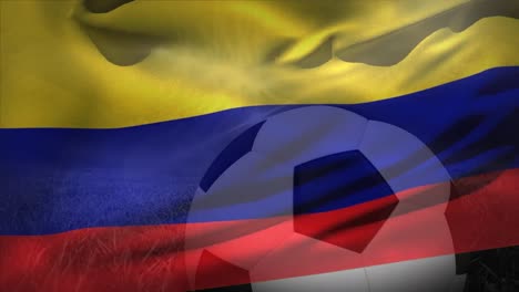 animation of flag of colombia over football on stadium