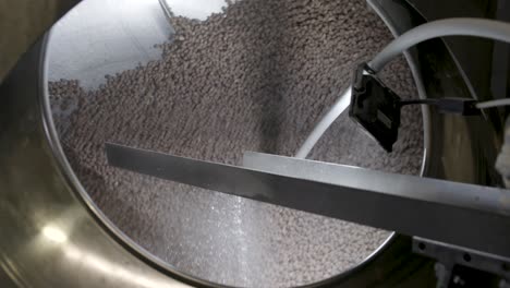 close shot of a nuts seasoning machine