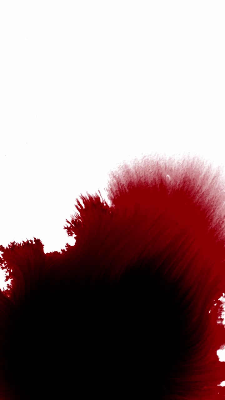 Vertikal animation af rødt blæk, der trænger ind i en hvid overflade, som blod på papir til gyser- eller kunstprojekter.