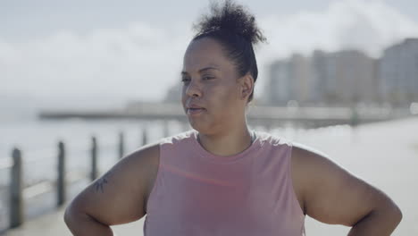 Portrait-of-a-plus-size-runner-standing-alone