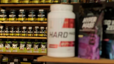 sport nutrition store interior with large choice of nutritional supplements.