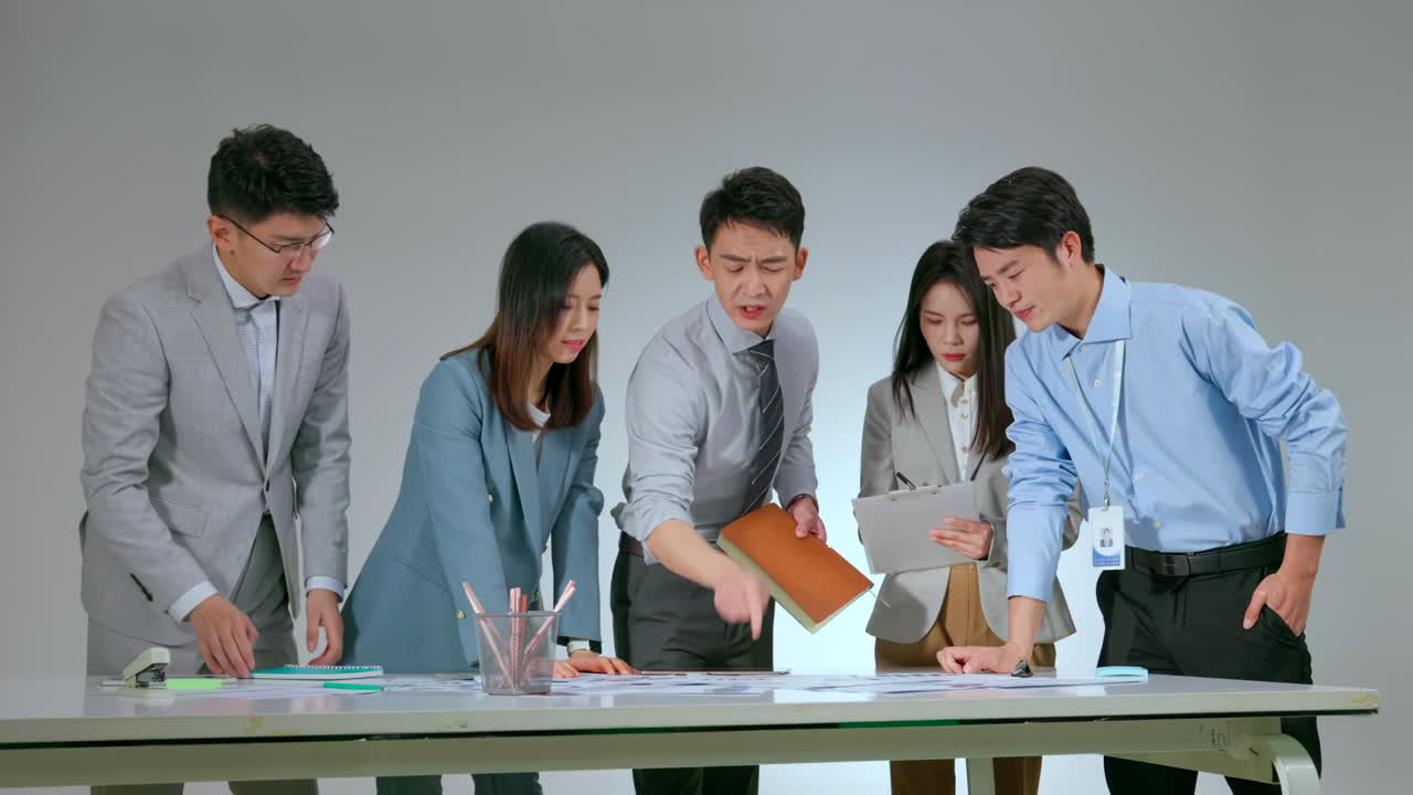 In-depth Analysis and Collaborative Discussion Over Pie Charts and Bar Graphs in a Business Meeting. Smart professional team collaborating, reviewing financial data, strategizing marketing plans