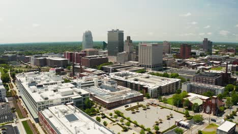 An-orbiting-drone-shot-of-the-Winston-Salem-skyline-in-North-Carolina-in-the-summer