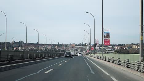 istanbul bridge with traffic and advertising