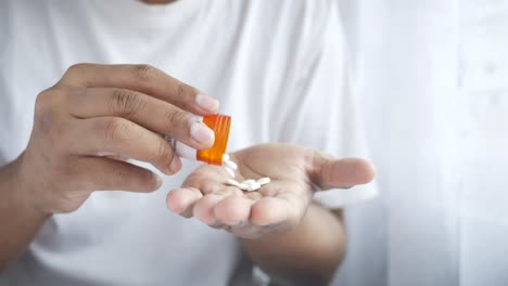 person taking pills