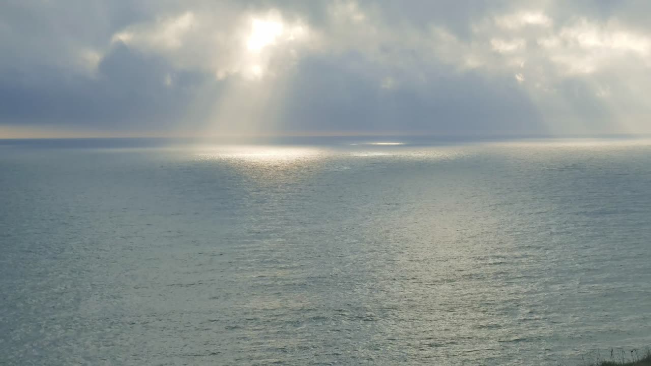 Timelapse Irish Coast light and sunshine dancing on shimmering sea Copper Coast Waterford Ireland Epic Locations in winter