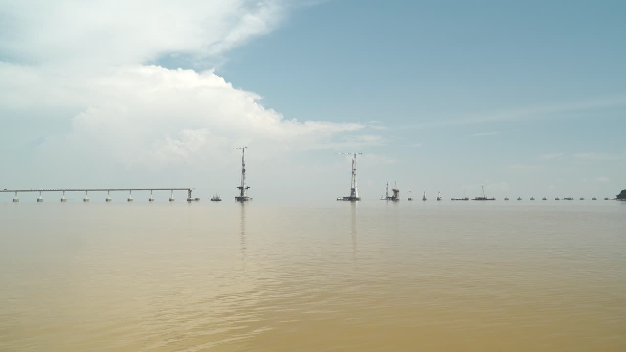 Batang Lupar Sarawak River Ferry Ride View During Summer And Under Construction Longest Bridge Conecting From each side,Sarawak,Borneo.