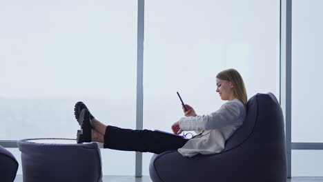 woman relaxing in a bean bag chair