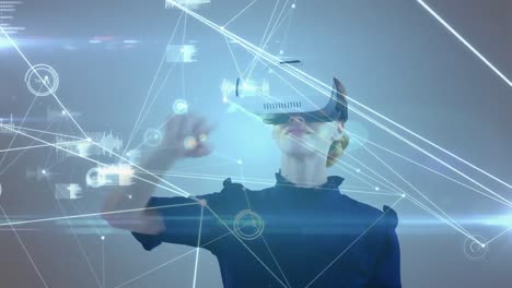 Animation-of-network-of-connections-over-businesswoman-wearing-vr-headsets